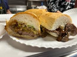 Domilise’s Po-Boy & Bar signature dishes Roast Beef
Half & Half Seafood
Oyster